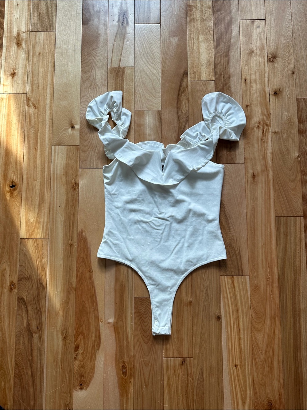 Lulu's Cream Ruffle Strap Bodysuit